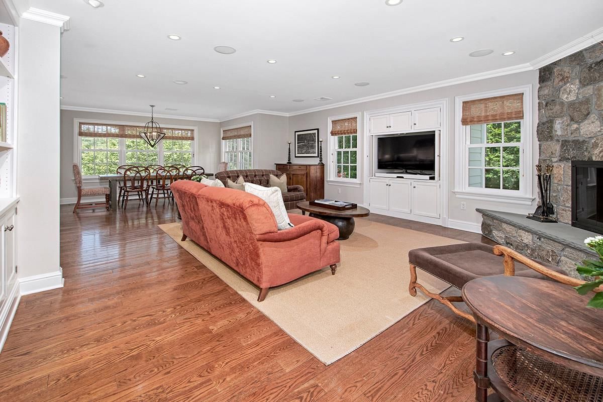 Dining room, Fireplace, Interior, Living room, Pendant Lights, Recessed Lighting, Stone Walls, Wood Texture Flooring