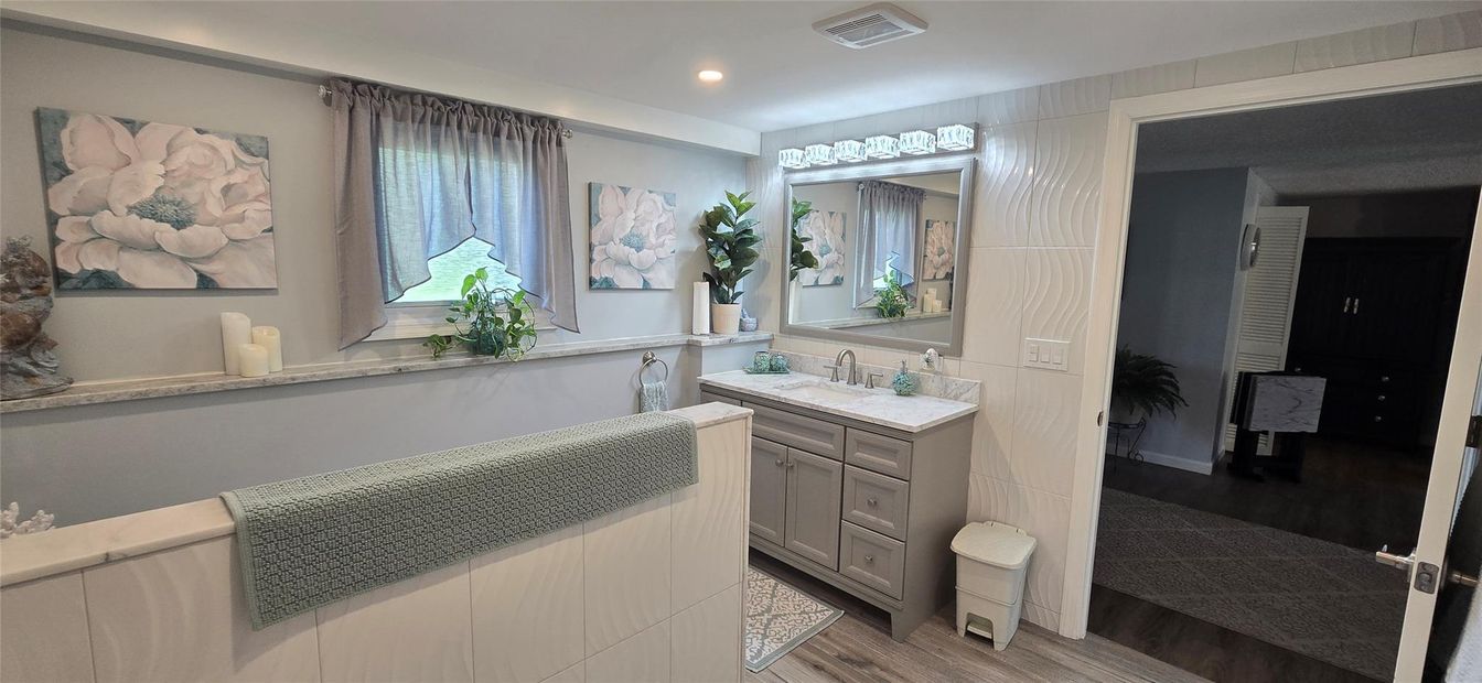Bathroom, Dual Sink Vanities, Interior, Recessed Lighting, Wood Texture Flooring