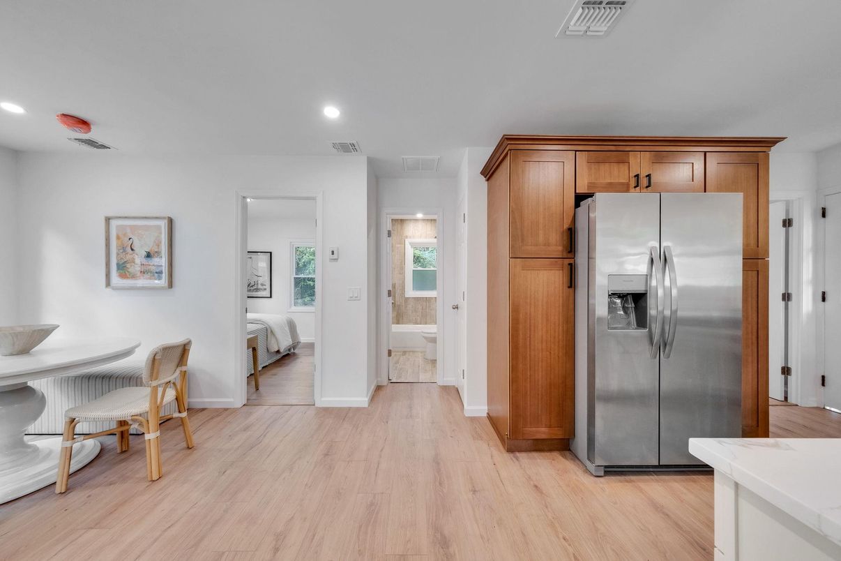 Dining room, Interior, Kitchen, Recessed Lighting, Stainless Steel Appliances, Wood Texture Flooring