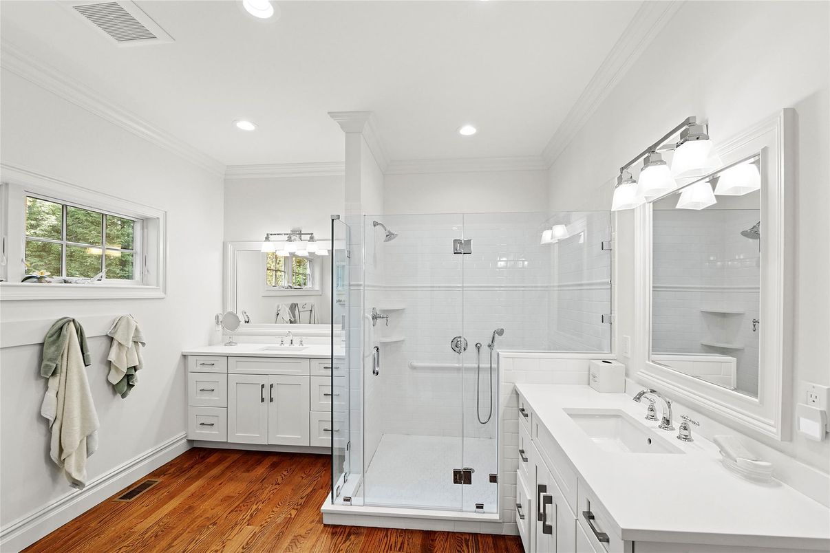 Bathroom, Dual Sink Vanities, Glass Shower, Interior, Recessed Lighting, Wood Texture Flooring