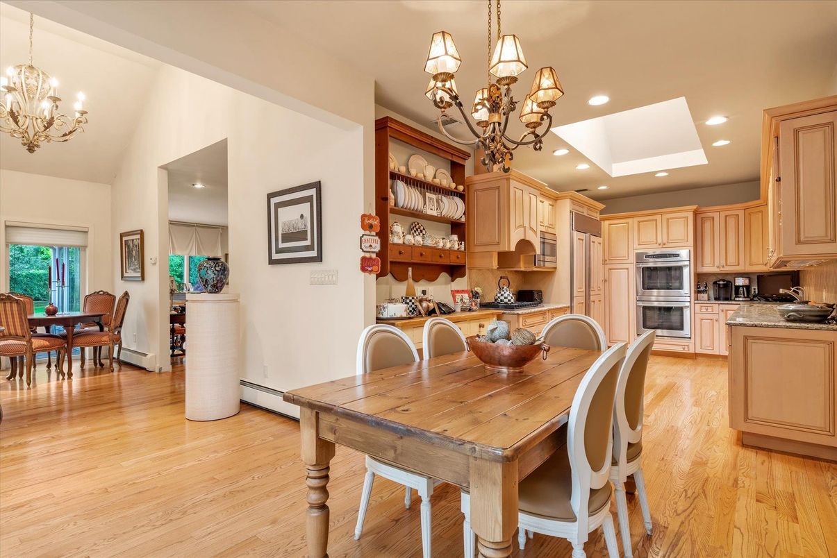 Chandelier, Dining room, Interior, Kitchen, Recessed Lighting, Stainless Steel Appliances, Wood Texture Flooring