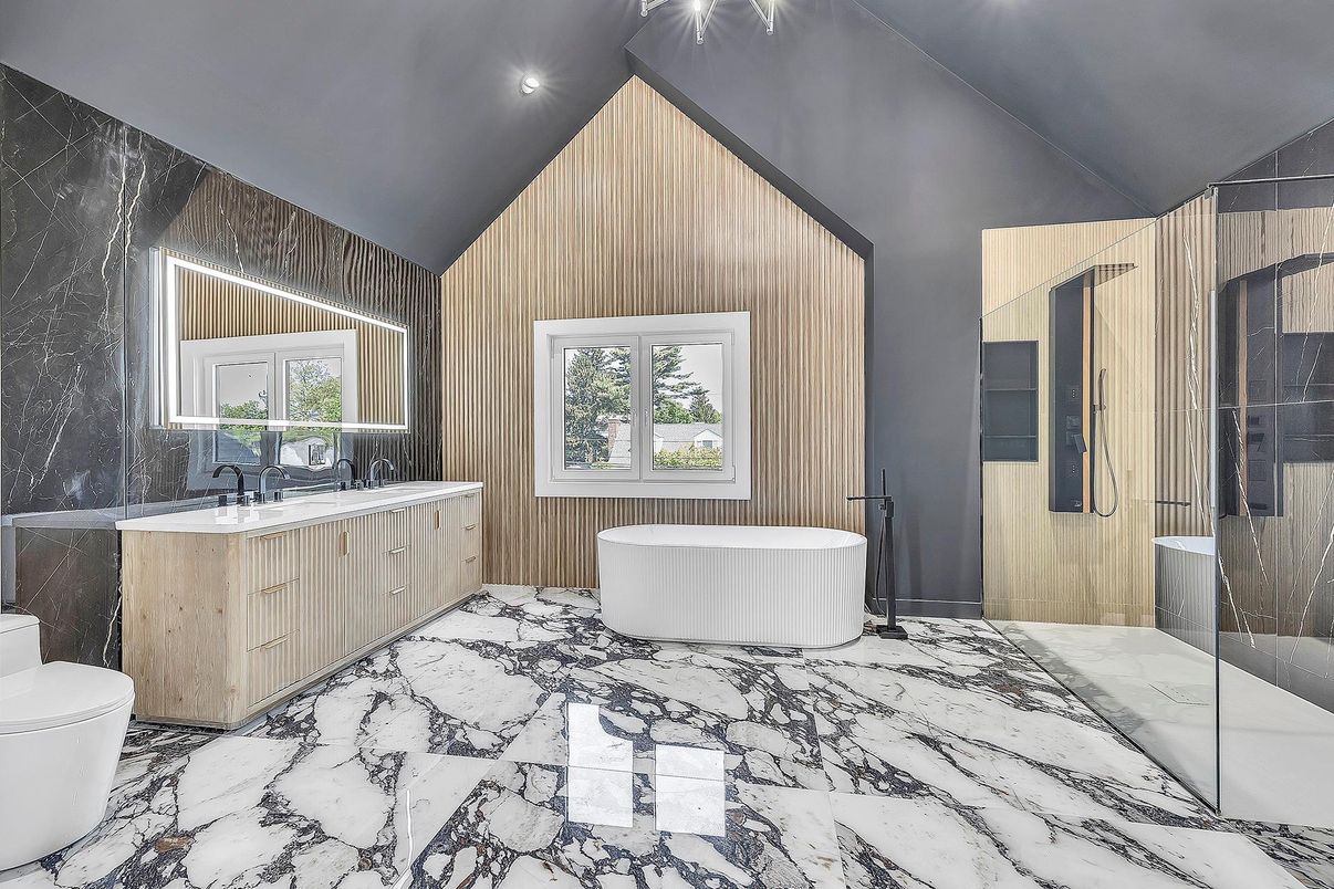 Bathroom, Dual Sink Vanities, Free Standing Baths, Interior, Marble, Recessed Lighting, Wooden Walls