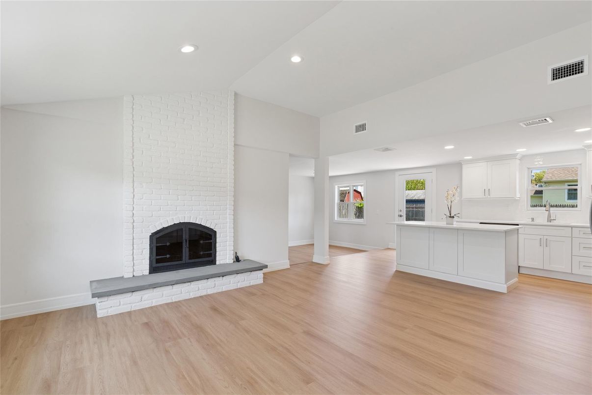 Fireplace, Interior, Kitchen, Recessed Lighting, Wood Texture Flooring