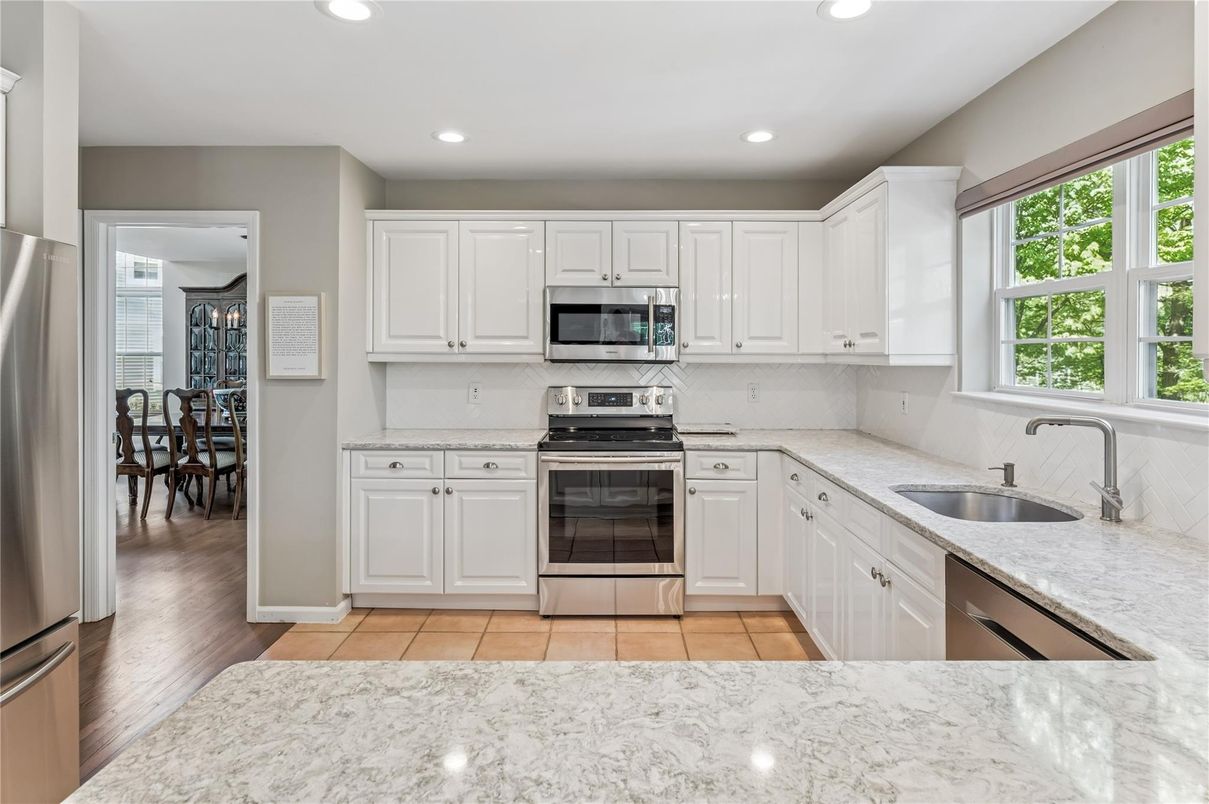 Dining room, Interior, Kitchen, Recessed Lighting, Stainless Steel Appliances, Wood Texture Flooring