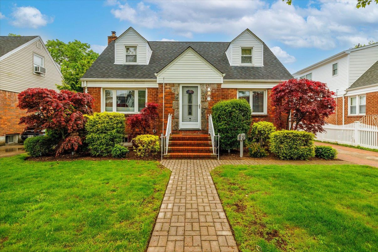 Exterior, Facade, Brick Facade, Cape Cod