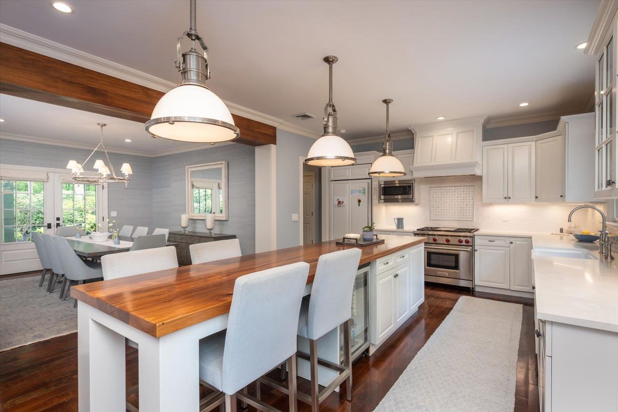 Dining room, Interior, Kitchen, Pendant Lights, Recessed Lighting, Stainless Steel Appliances, Wood Texture Flooring