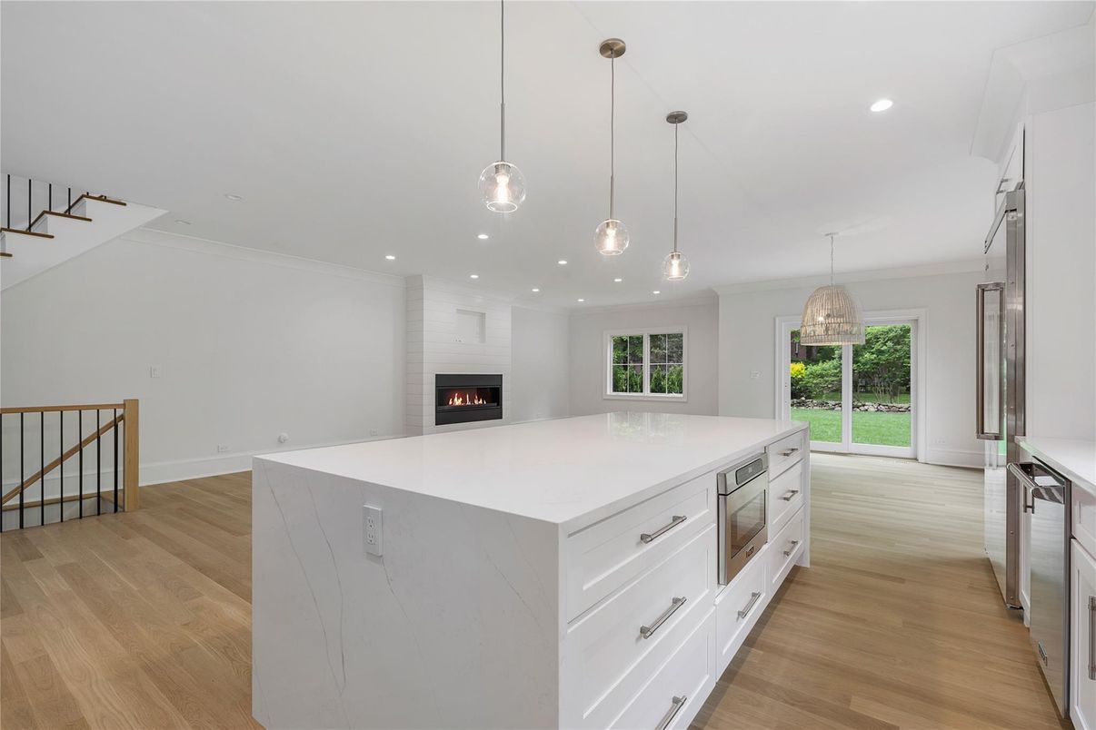 Fireplace, Interior, Kitchen, Pendant Lights, Recessed Lighting, Wood Texture Flooring
