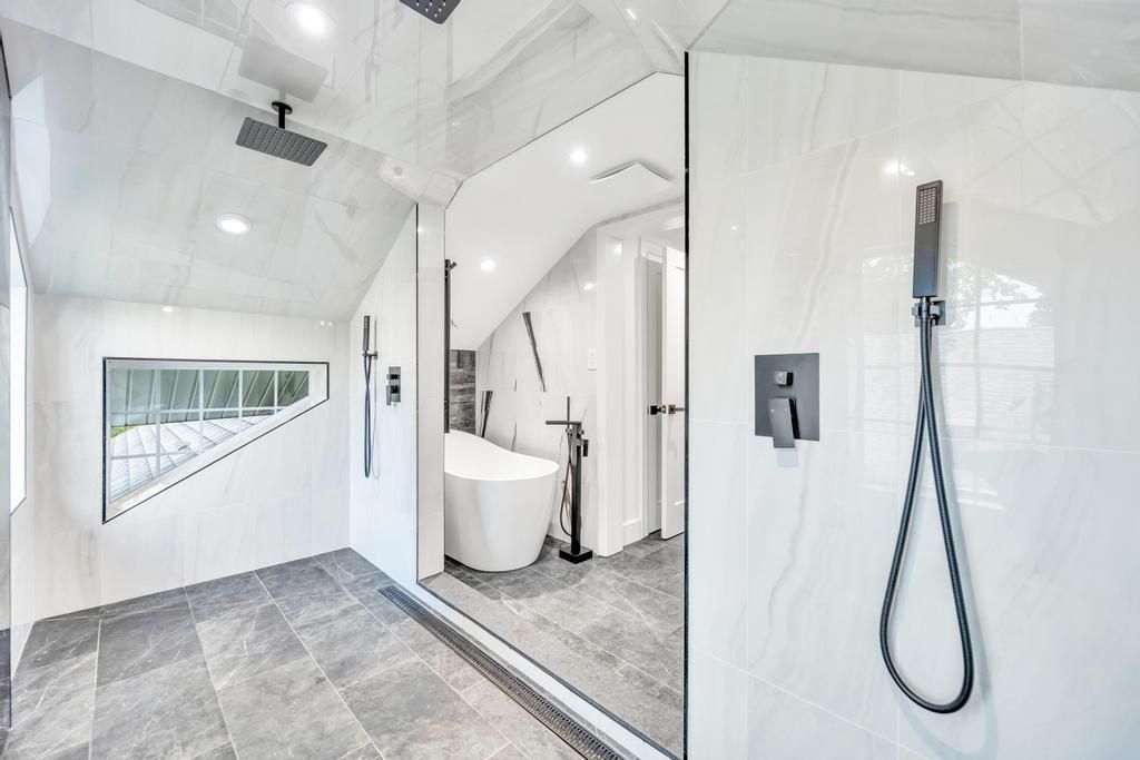 Bathroom, Free Standing Baths, Glass Shower, Interior, Marble Walls, Recessed Lighting