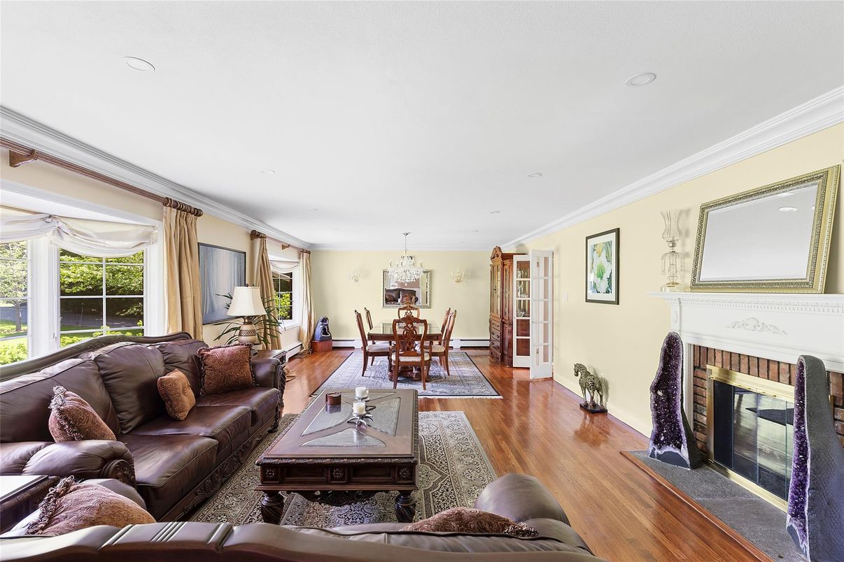 Chandelier, Dining room, Fireplace, Interior, Living room, Recessed Lighting, Wood Texture Flooring
