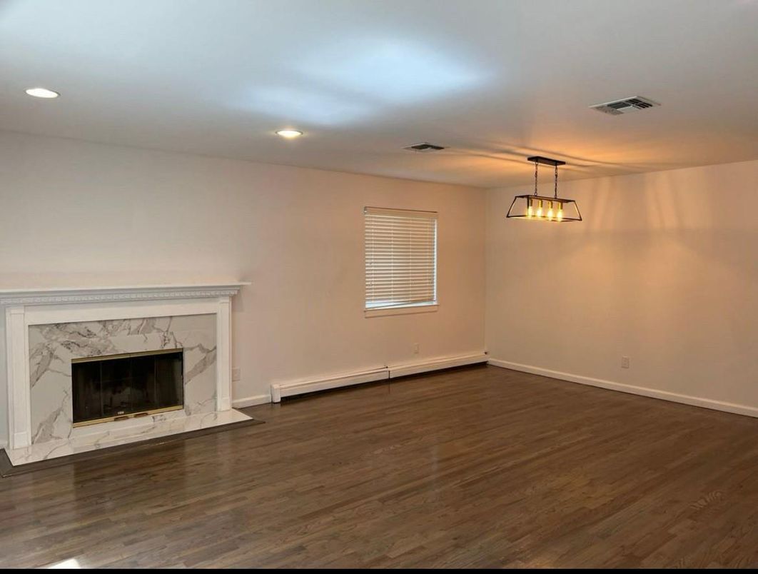 Empty room, Fireplace, Interior, Pendant Lights, Recessed Lighting, Wood Texture Flooring