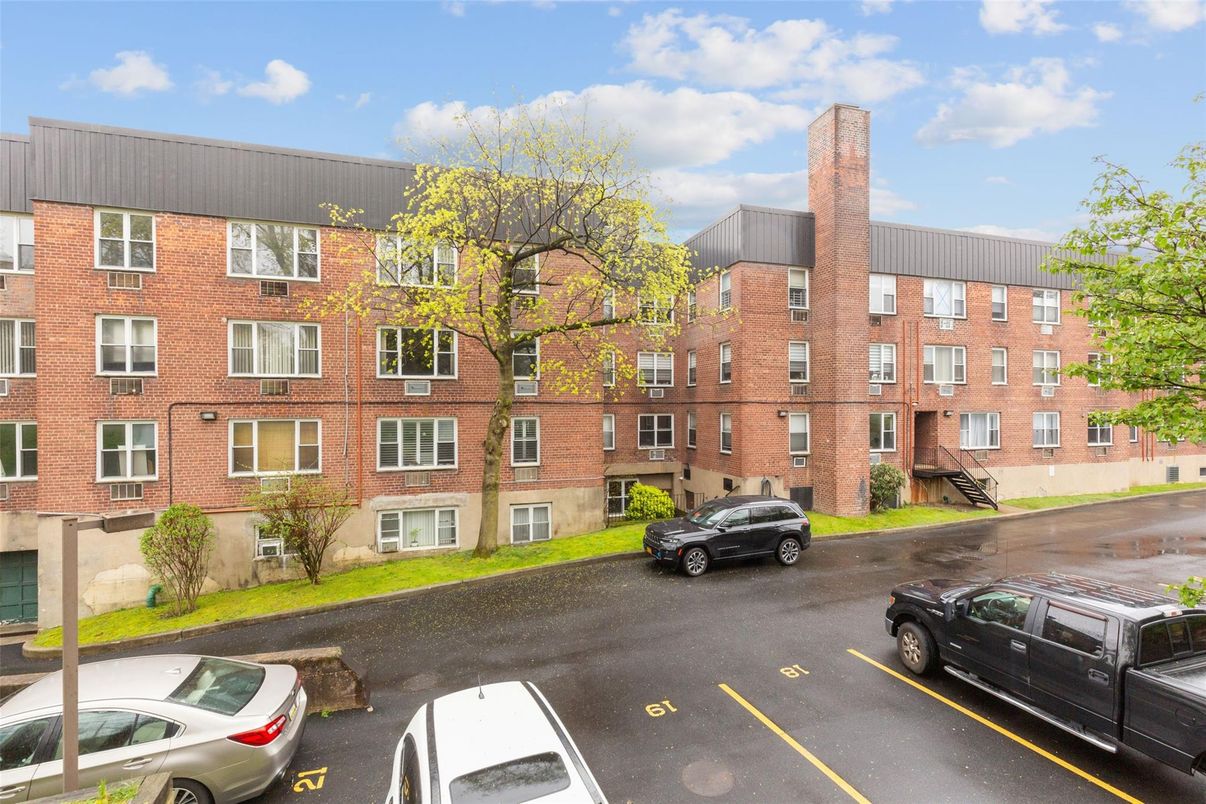 Exterior, Facade, Brick Facade, Condo Building