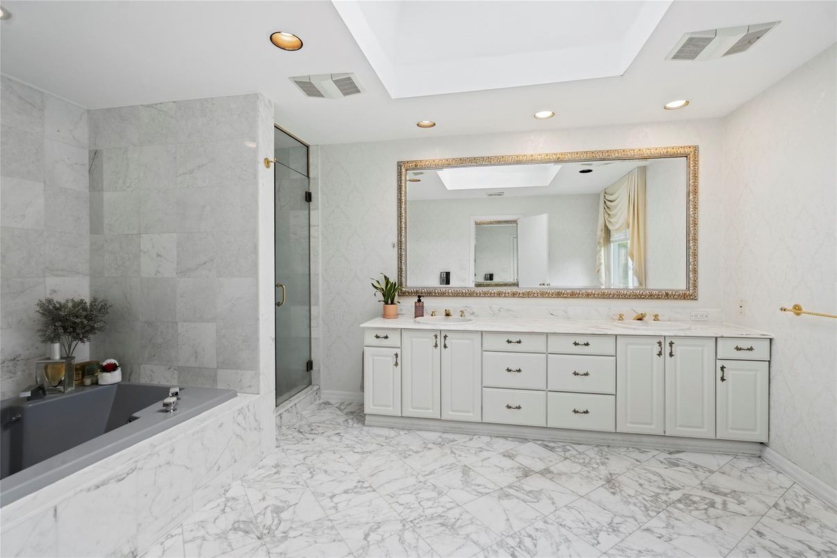 Bathroom, Dual Sink Vanities, Glass Shower, Interior, Marble, Marble Walls, Recessed Lighting