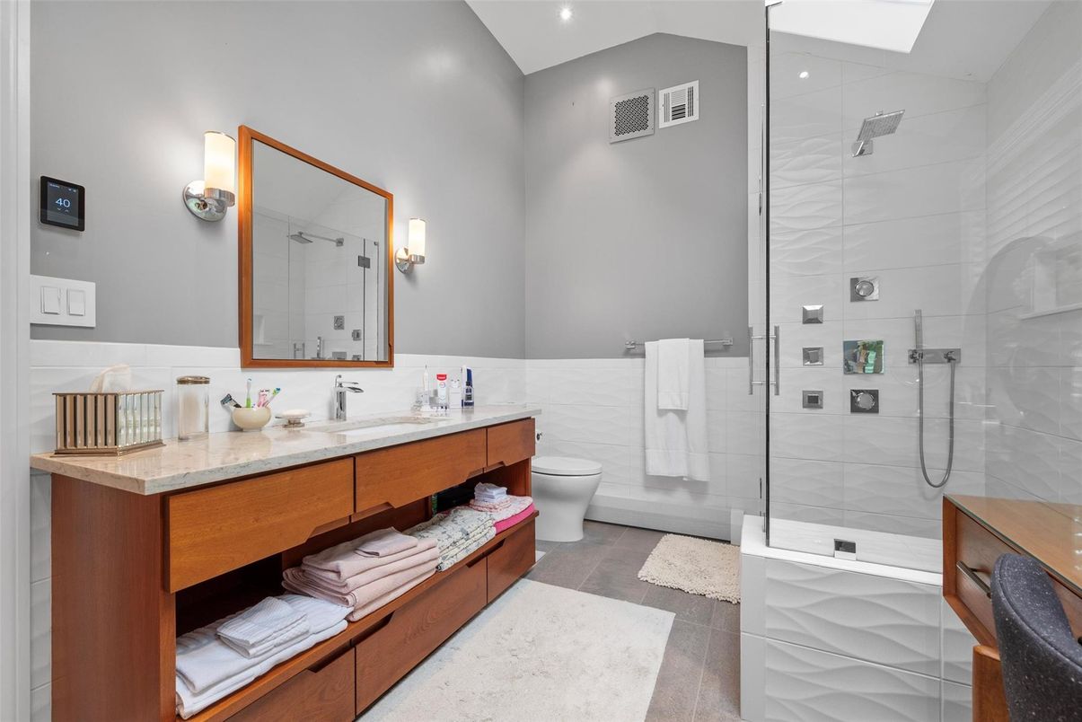 Bathroom, Dual Sink Vanities, Glass Shower, Interior, Recessed Lighting, Wood Texture Flooring