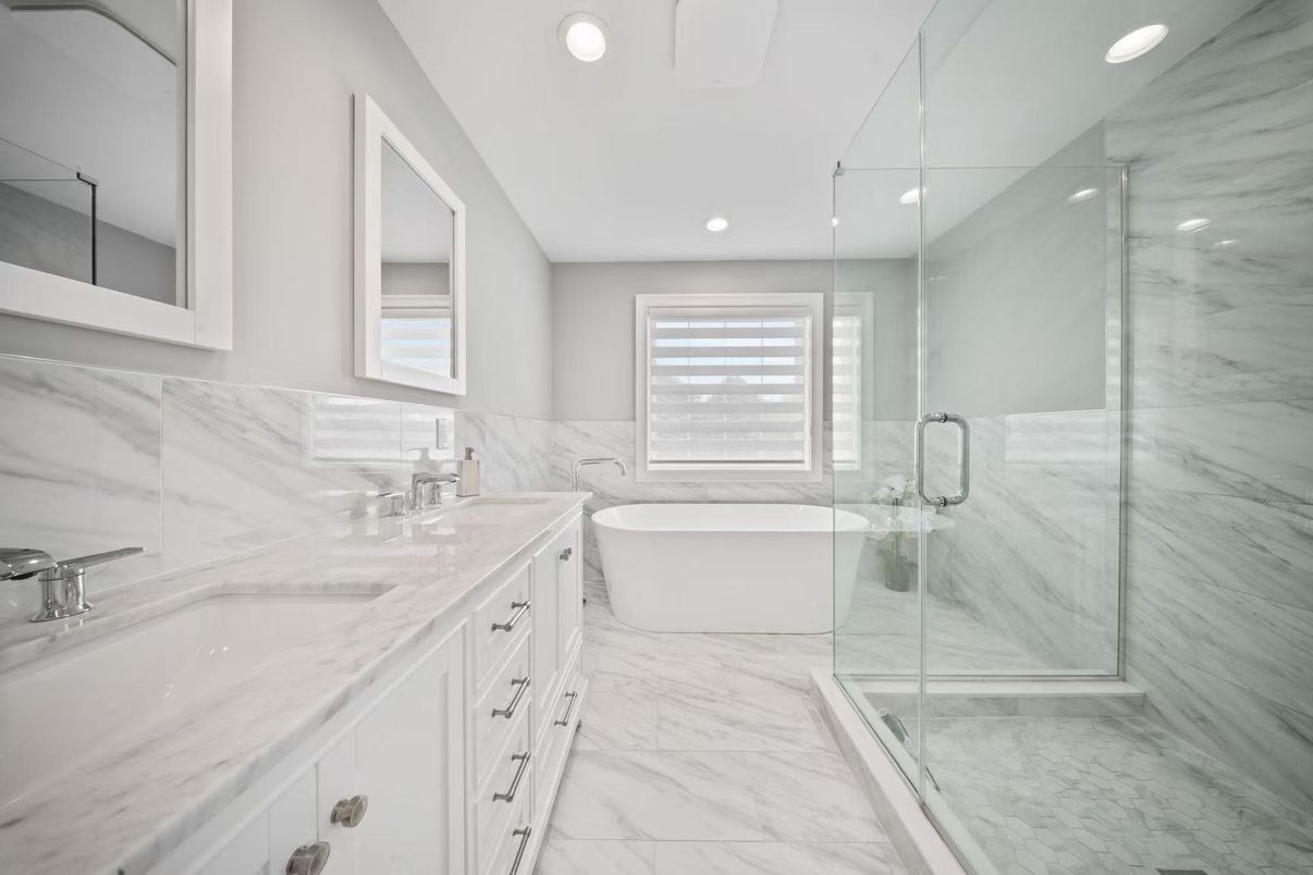 Bathroom, Dual Sink Vanities, Free Standing Baths, Glass Shower, Interior, Marble, Marble Walls, Recessed Lighting