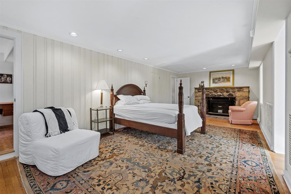 Bedroom, Fireplace, Interior, Recessed Lighting, Wood Texture Flooring