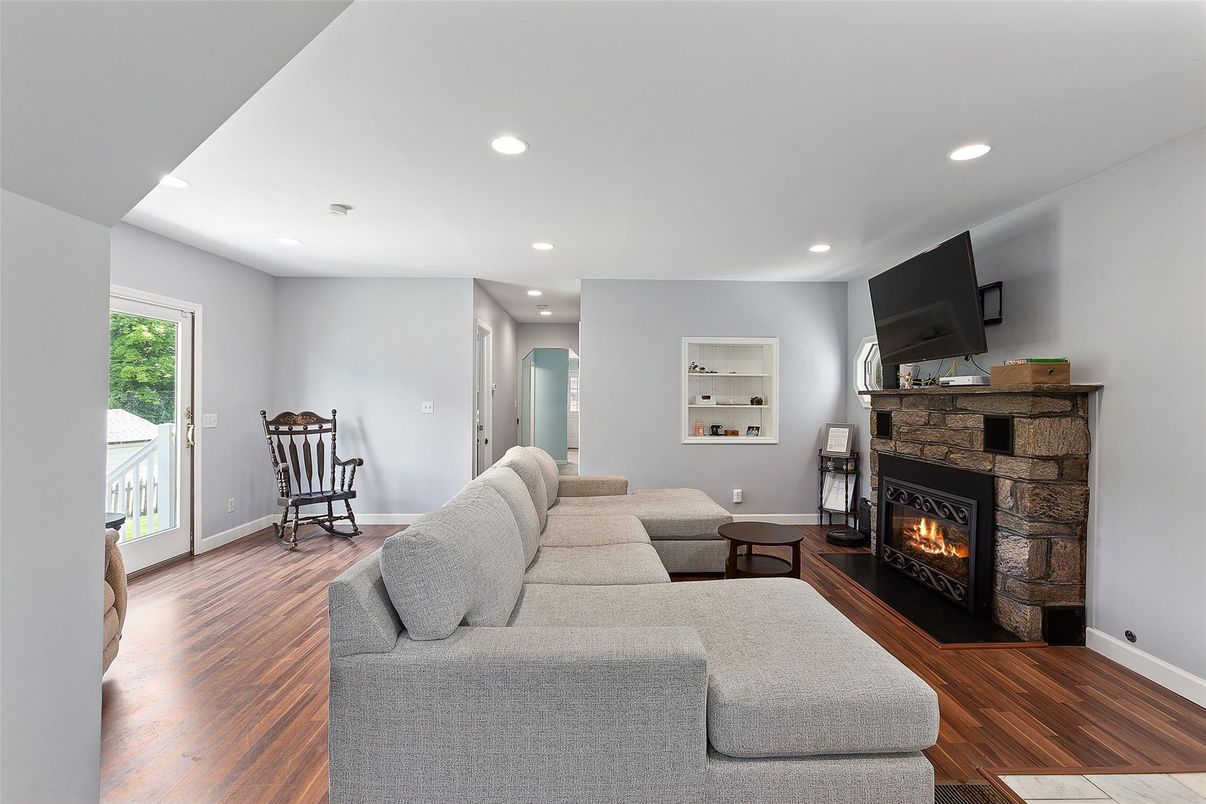 Fireplace, Interior, Living room, Recessed Lighting, Wood Texture Flooring