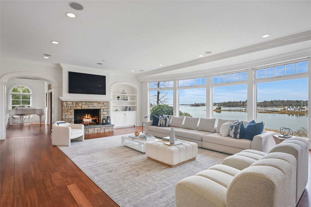 Fireplace, Interior, Living room, Recessed Lighting, Water, Wood Texture Flooring