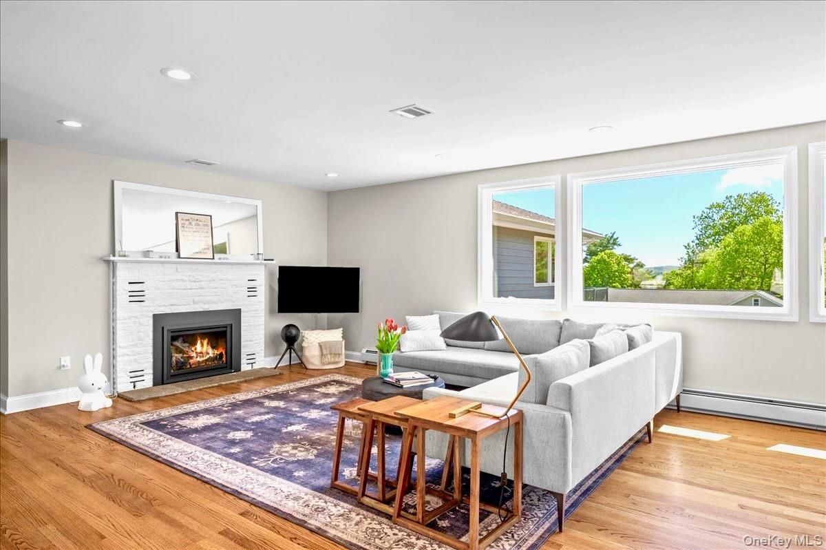 Fireplace, Interior, Living room, Recessed Lighting, Wood Texture Flooring