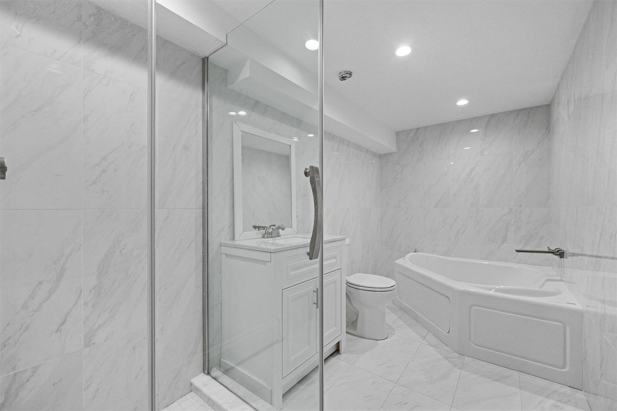 Bathroom, Dual Sink Vanities, Interior, Marble, Marble Walls, Recessed Lighting