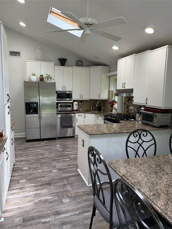 Interior, Kitchen, Recessed Lighting, Stainless Steel Appliances, Wood Texture Flooring