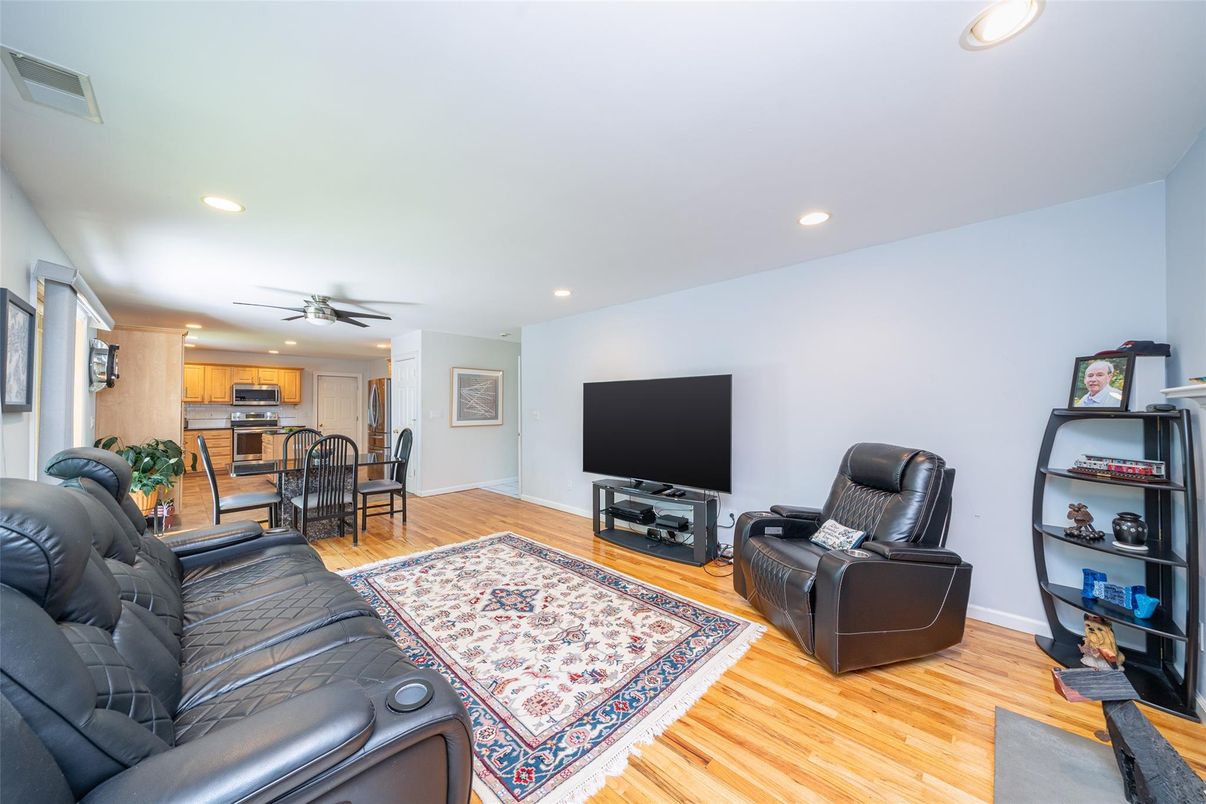 Dining room, Interior, Kitchen, Living room, Recessed Lighting, Stainless Steel Appliances, Wood Texture Flooring