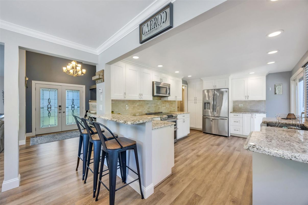 Chandelier, Interior, Kitchen, Recessed Lighting, Stainless Steel Appliances, Wood Texture Flooring