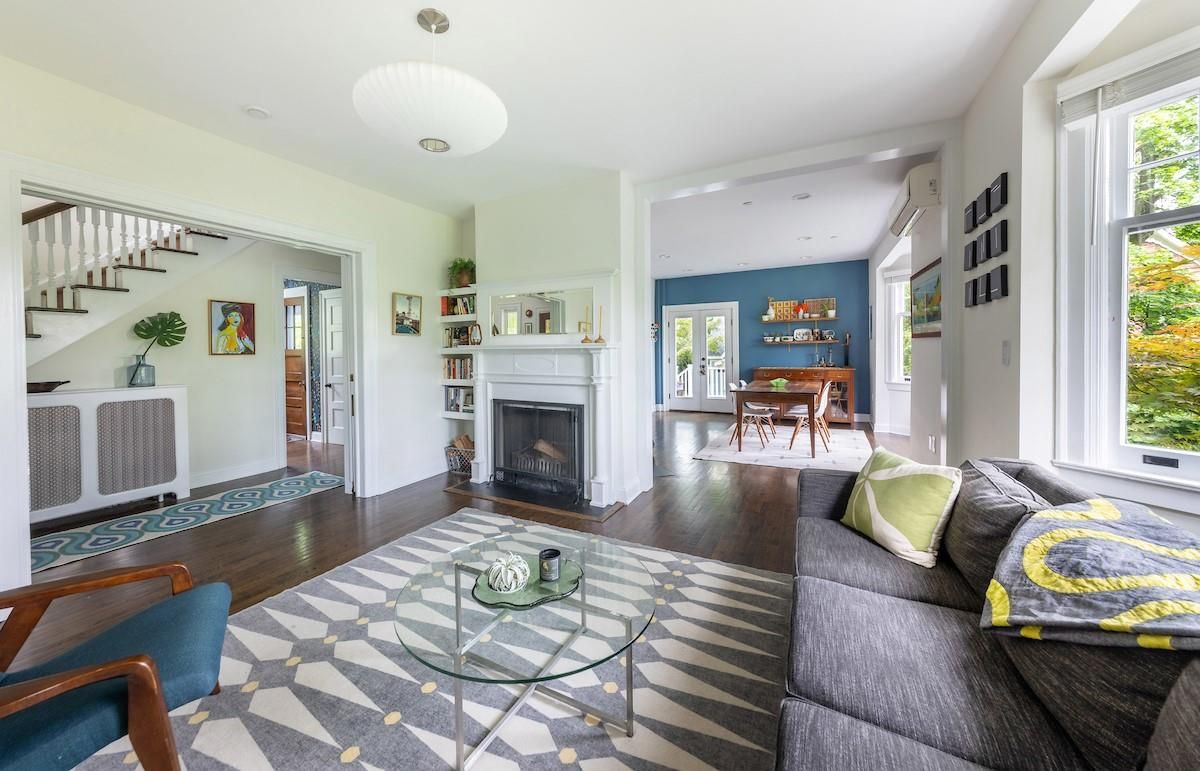 Dining room, Fireplace, Interior, Living room, Pendant Lights, Recessed Lighting, Wood Texture Flooring