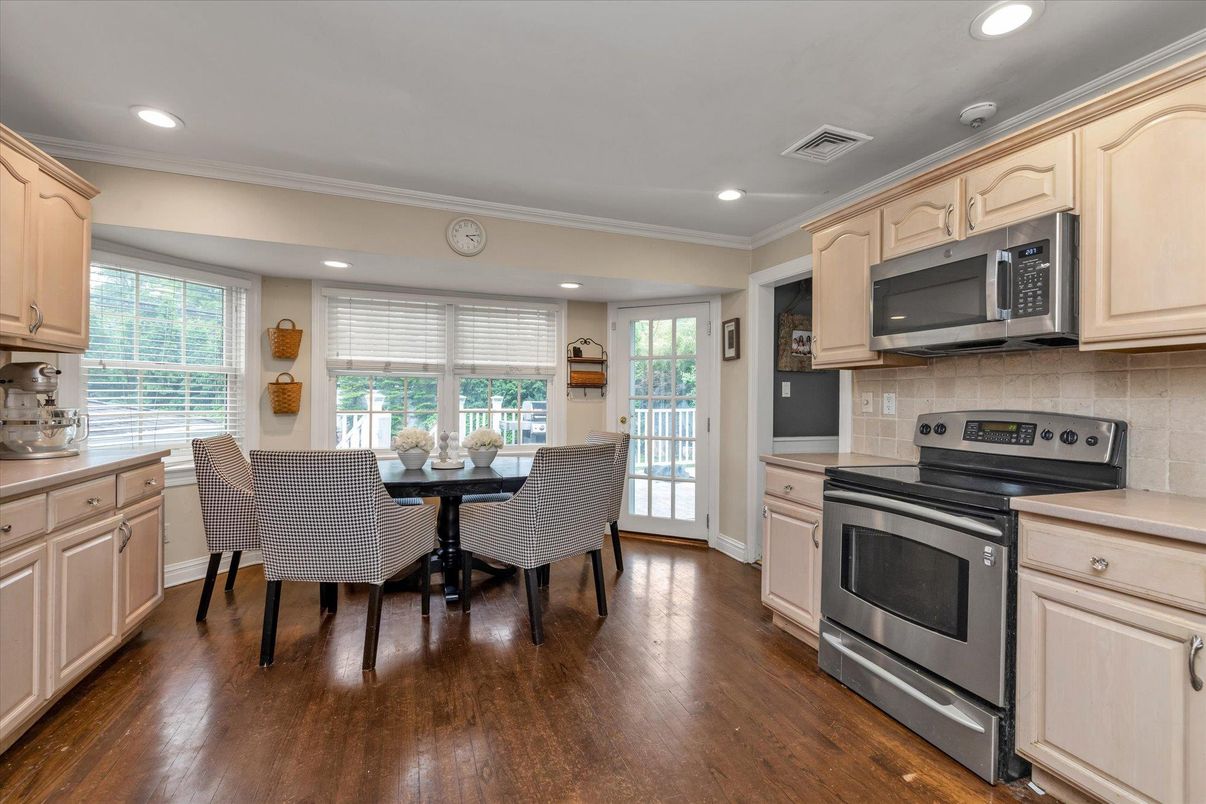 Dining room, Interior, Kitchen, Recessed Lighting, Stainless Steel Appliances, Wood Texture Flooring