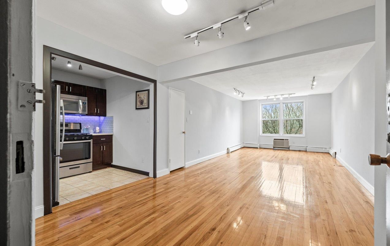 Empty room, Interior, Kitchen, Stainless Steel Appliances, Wood Texture Flooring