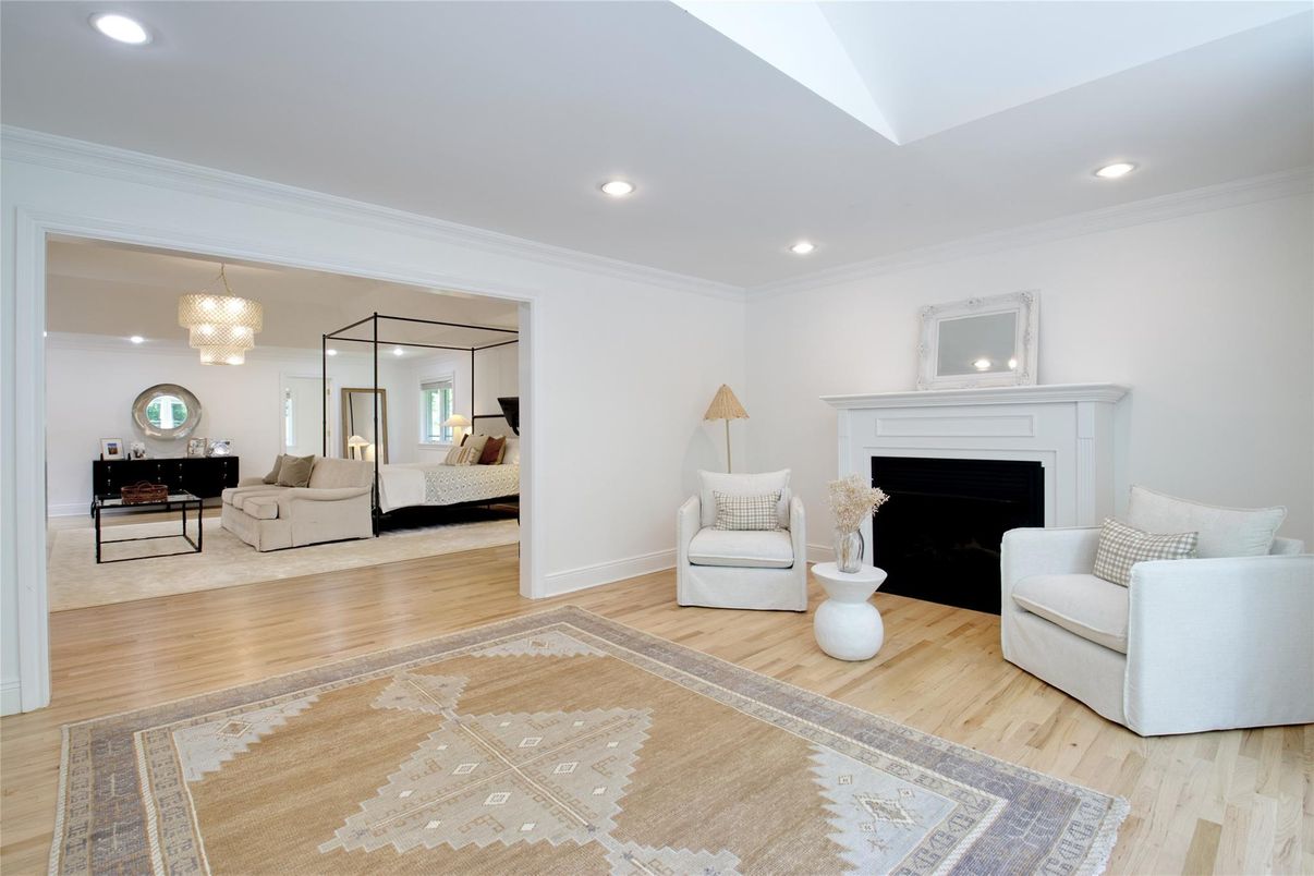 Bedroom, Chandelier, Fireplace, Interior, Living room, Recessed Lighting, Wood Texture Flooring