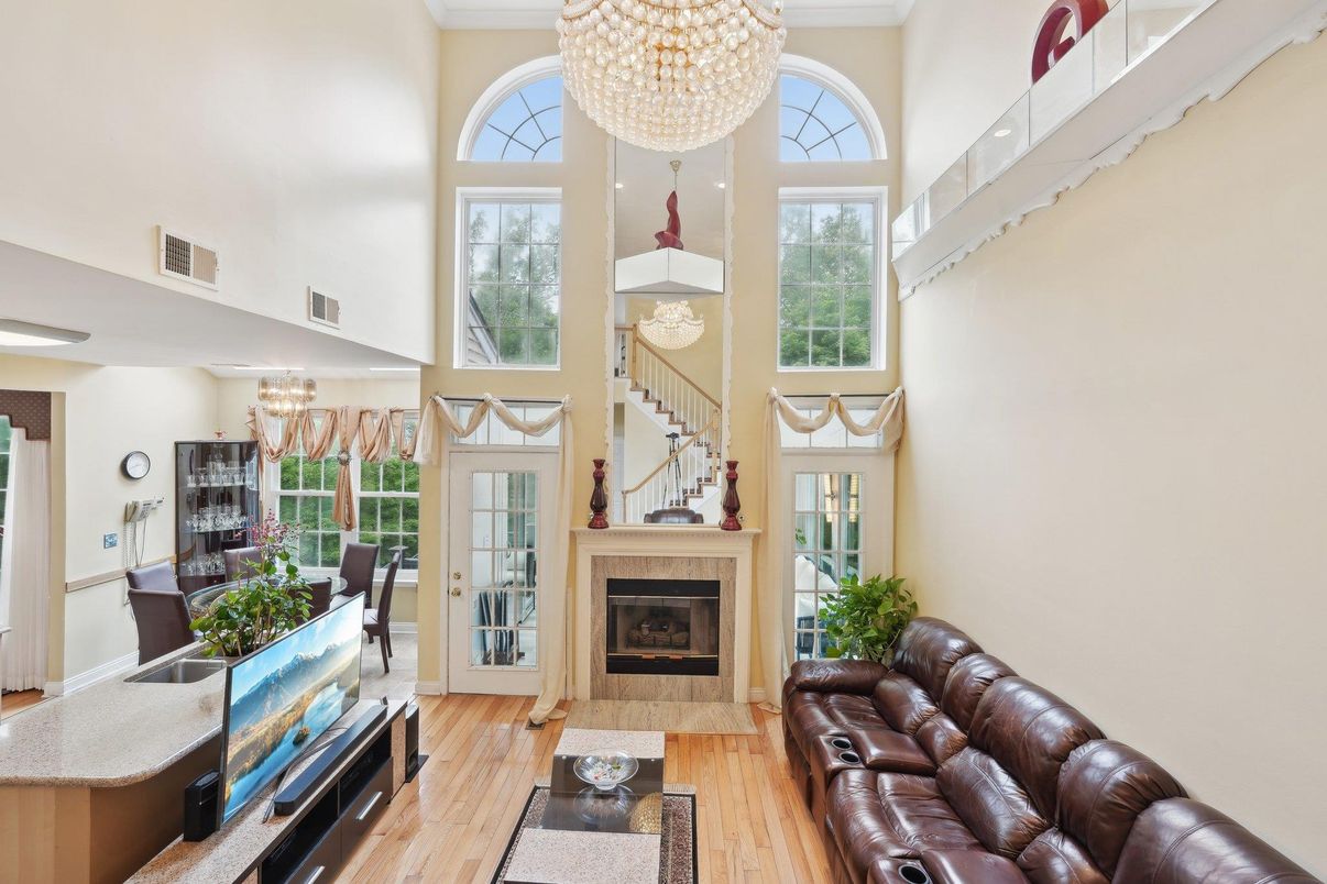Chandelier, Dining room, Fireplace, Interior, Living room, Wood Texture Flooring