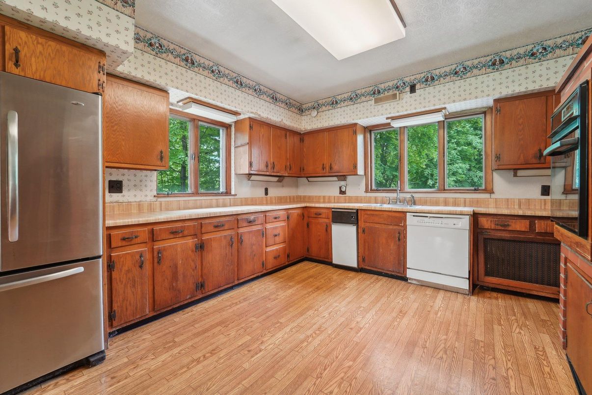 Interior, Kitchen, Stainless Steel Appliances, Tile Countertops, Wood Texture Flooring
