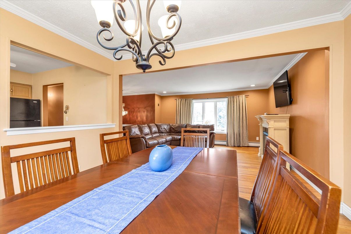 Chandelier, Dining room, Fireplace, Interior, Living room, Recessed Lighting, Wood Texture Flooring