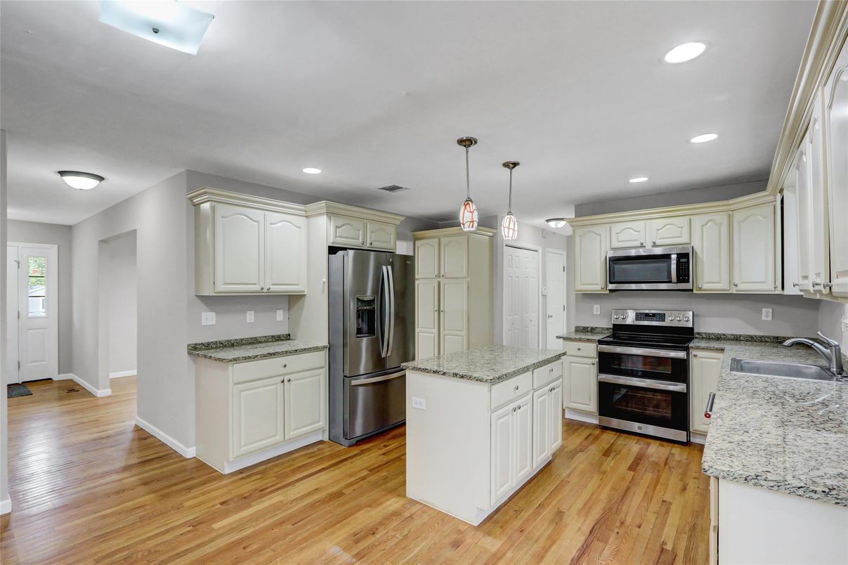 Interior, Kitchen, Pendant Lights, Recessed Lighting, Stainless Steel Appliances, Wood Texture Flooring