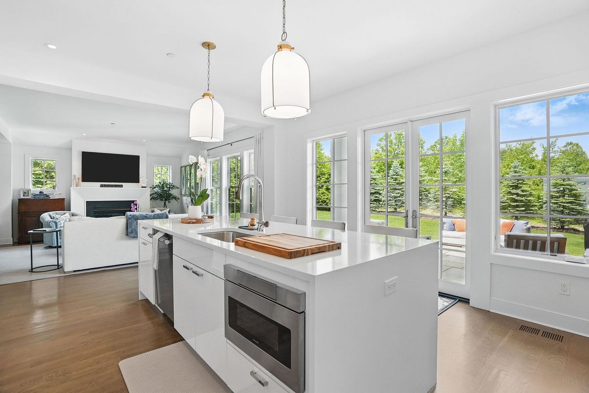 Fireplace, Interior, Kitchen, Living room, Pendant Lights, Recessed Lighting, Stainless Steel Appliances, Wood Texture Flooring