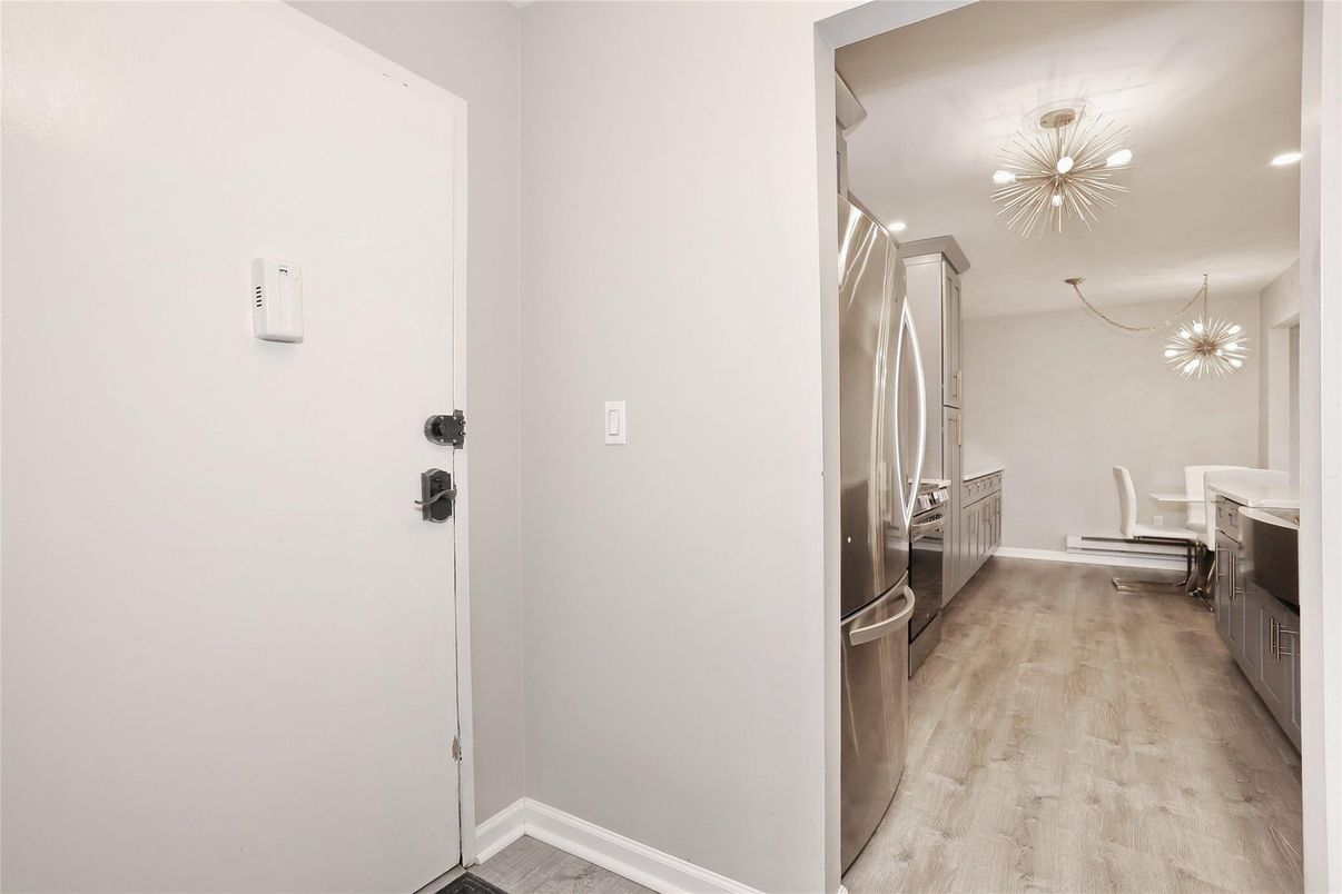 Chandelier, Interior, Pendant Lights, Recessed Lighting, Stainless Steel Appliances, Wood Texture Flooring