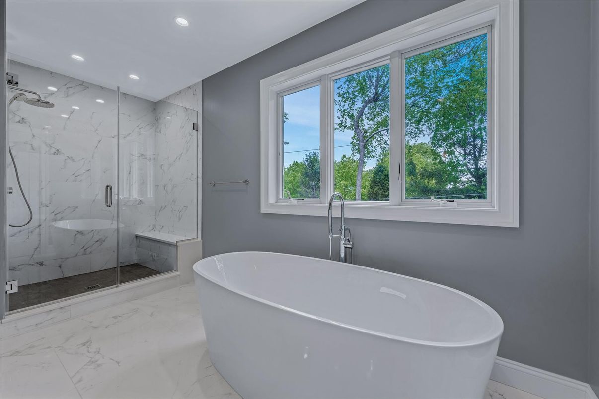 Bathroom, Free Standing Baths, Glass Shower, Interior, Marble, Marble Walls, Recessed Lighting