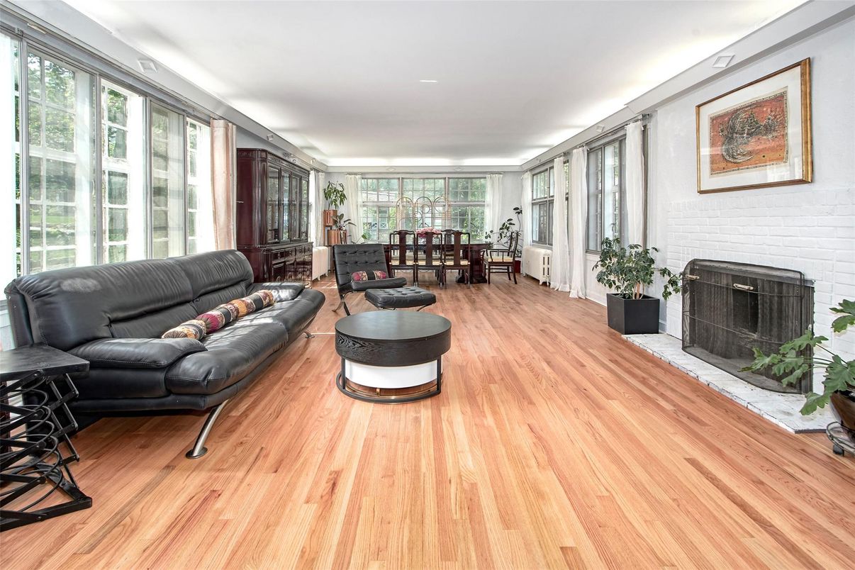 Dining room, Fireplace, Interior, Living room, Recessed Lighting, Wood Texture Flooring
