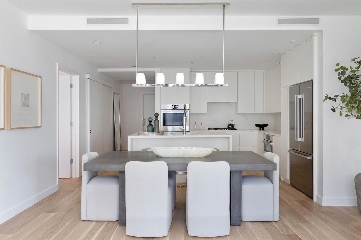 Dining room, Interior, Kitchen, Pendant Lights, Recessed Lighting, Stainless Steel Appliances, Wood Texture Flooring