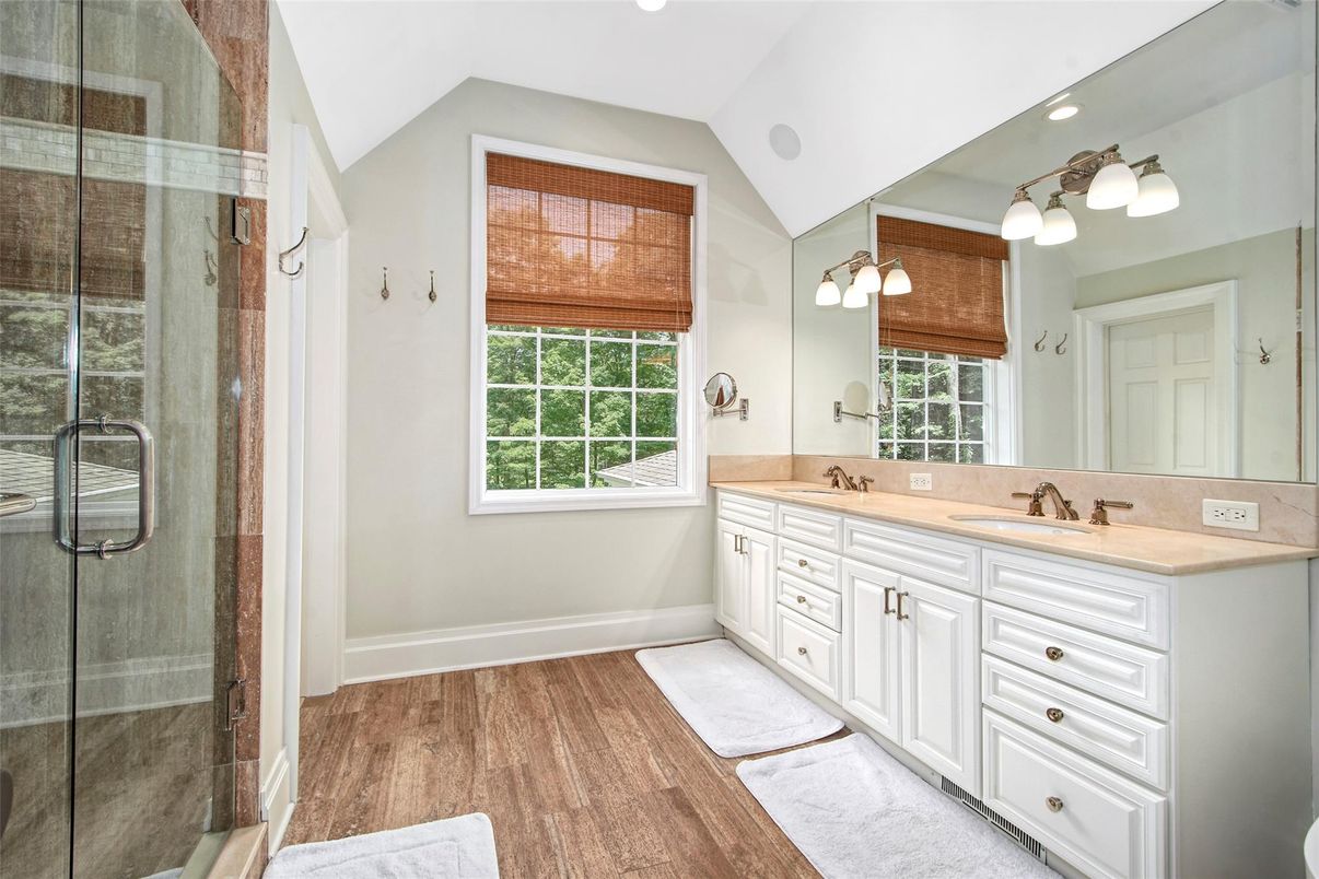 Bathroom, Dual Sink Vanities, Glass Shower, Interior, Recessed Lighting, Wood Texture Flooring