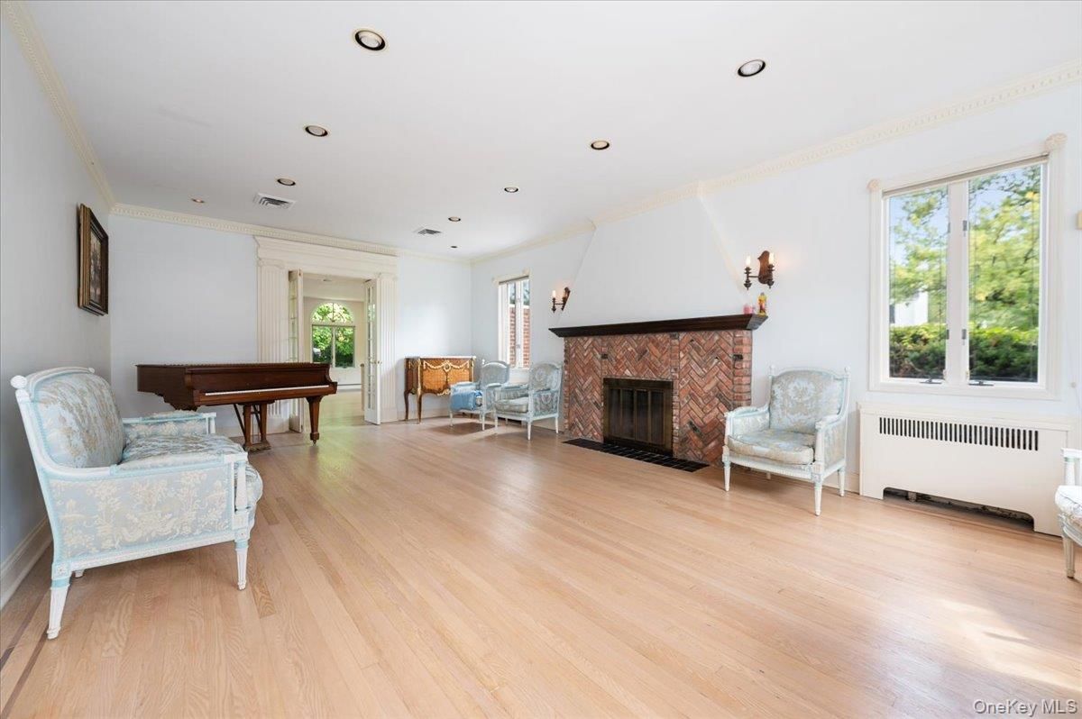 Fireplace, Interior, Piano, Recessed Lighting, Wood Texture Flooring