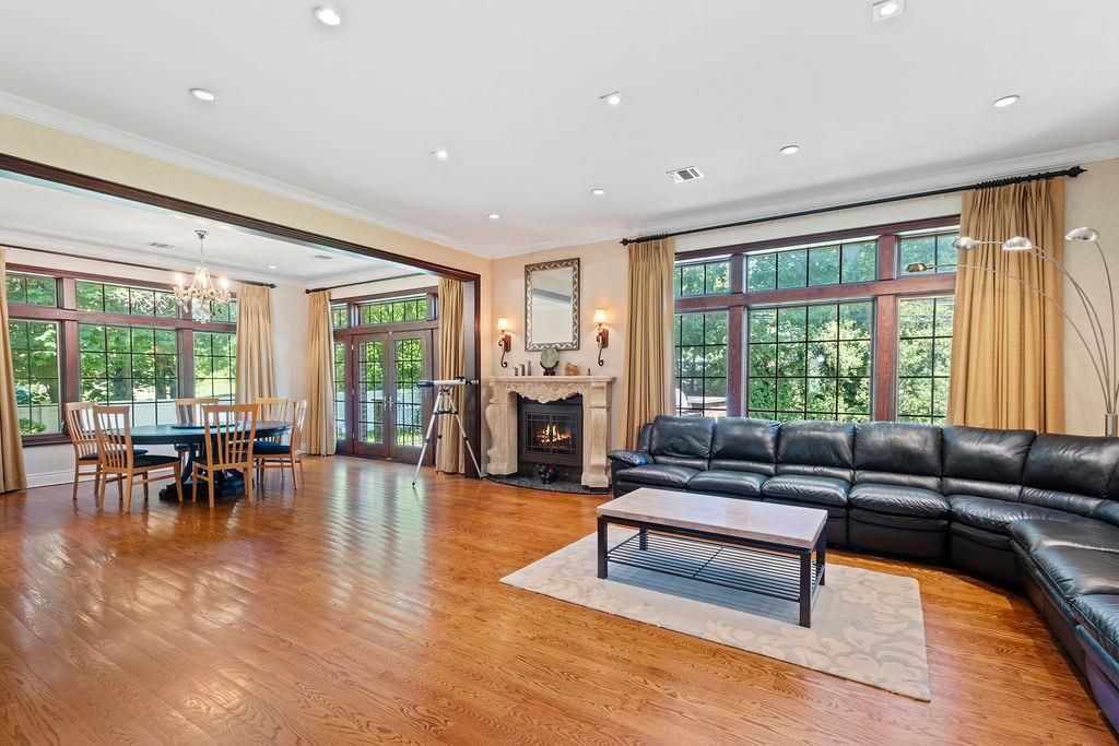 Chandelier, Dining room, Fireplace, Interior, Living room, Recessed Lighting, Wood Texture Flooring