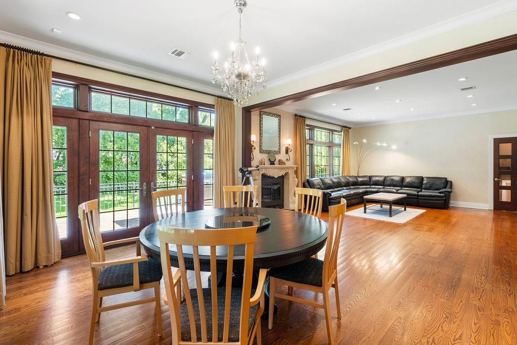 Chandelier, Dining room, Fireplace, Interior, Living room, Recessed Lighting, Wood Texture Flooring