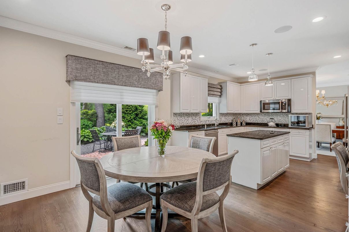 Chandelier, Dining room, Interior, Kitchen, Pendant Lights, Recessed Lighting, Stainless Steel Appliances, Wood Texture Flooring