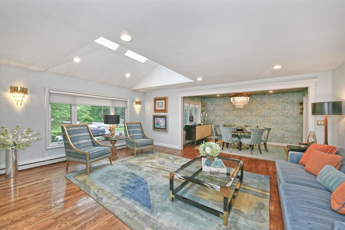 Chandelier, Dining room, Interior, Living room, Recessed Lighting, Stone Walls, Wood Texture Flooring