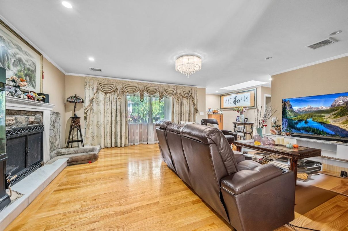 Chandelier, Fireplace, Interior, Living room, Recessed Lighting, Wood Texture Flooring