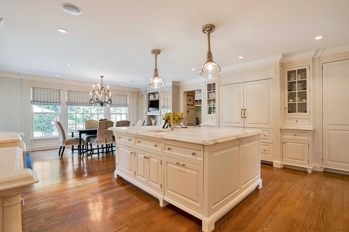 Chandelier, Dining room, Fireplace, Interior, Kitchen, Recessed Lighting, Wood Texture Flooring