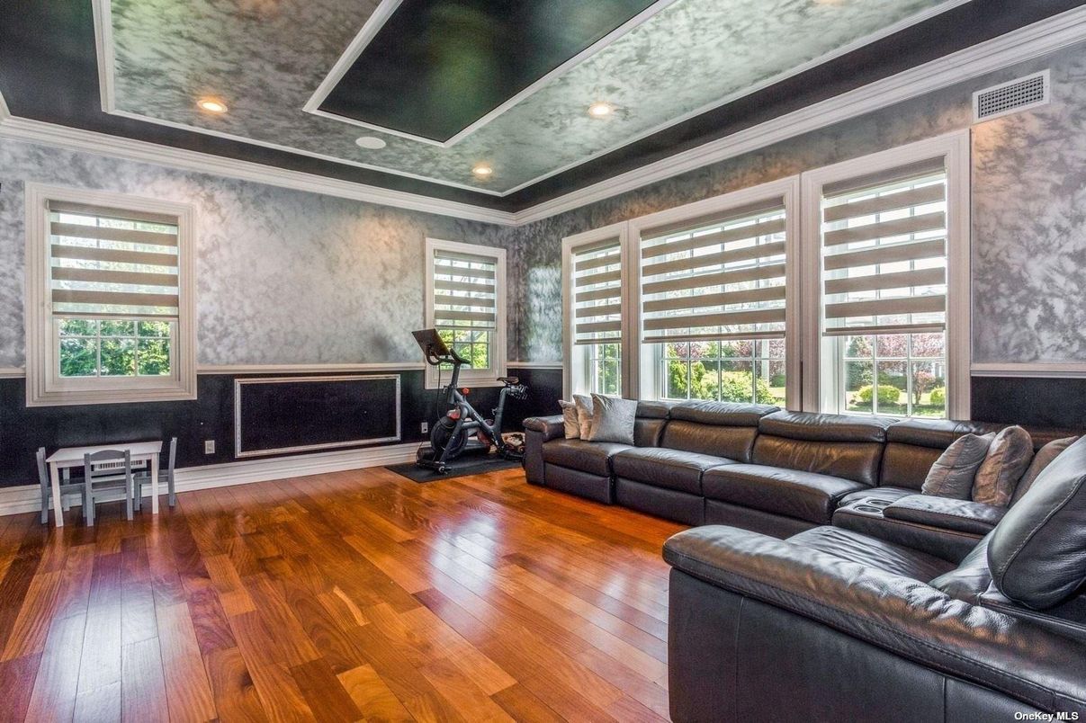 Fireplace, Fitness Equipment, Interior, Living room, Recessed Lighting, Wood Texture Flooring
