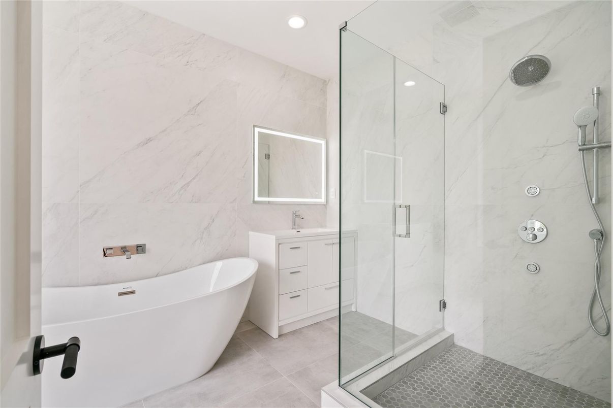 Bathroom, Free Standing Baths, Glass Shower, Interior, Marble Walls, Recessed Lighting
