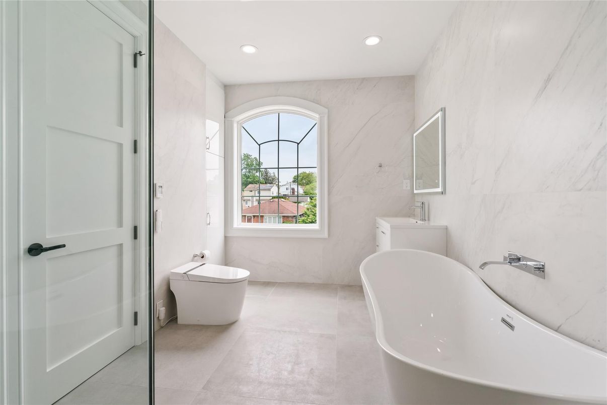 Bathroom, Free Standing Baths, Glass Shower, Interior, Marble Walls, Recessed Lighting
